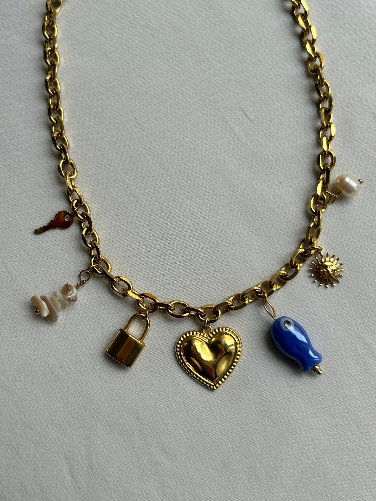 Chaîne Kardia - charms attachés