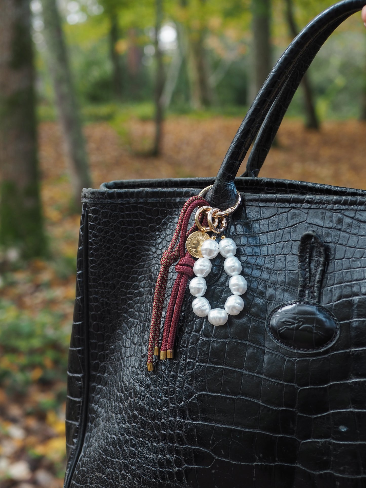 4/ Porte-clés Grigri perles et bordeaux
