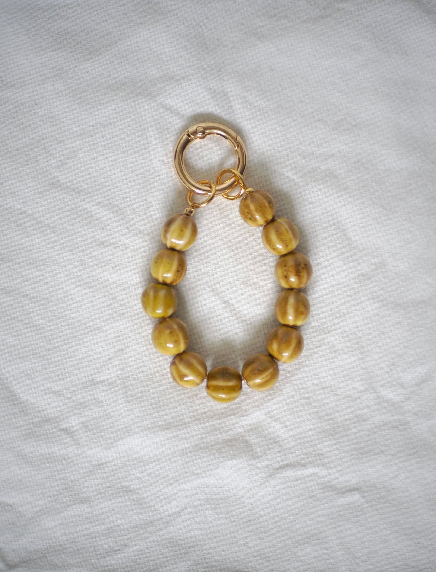 Grigri pendant perles céramiques