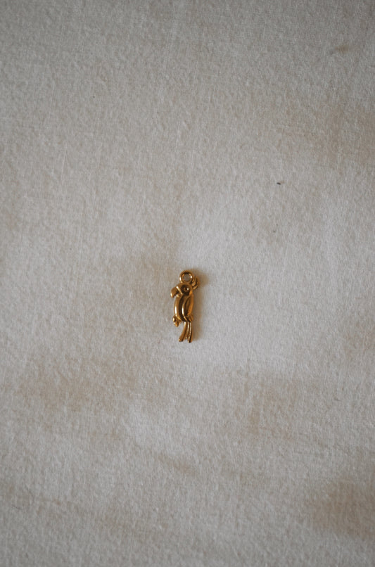 Charm perroquet doré