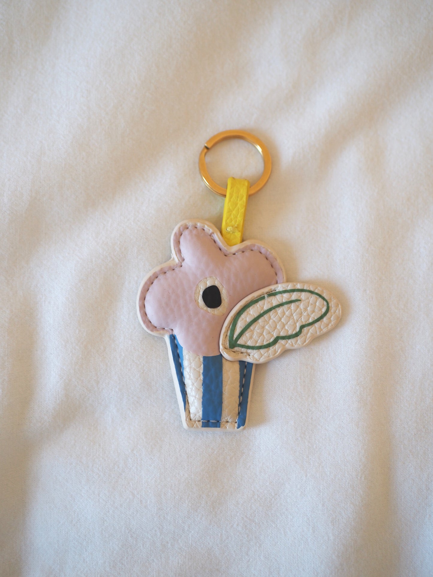 Grigri fleur cuir